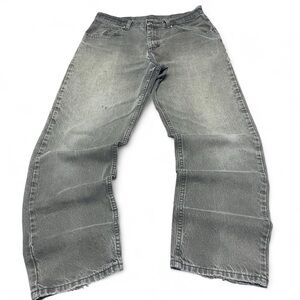 Vintage wrangler green faded distressed denim jeans